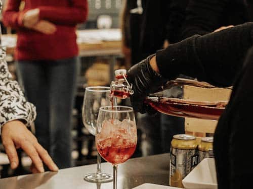 Pouring Wine at Binksberry Hollow Event